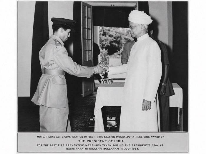 Preserved historical photograph of Mohammed Irshad Ali Sahib during a recognition moment connected to the President of India’s stay in July 1963.